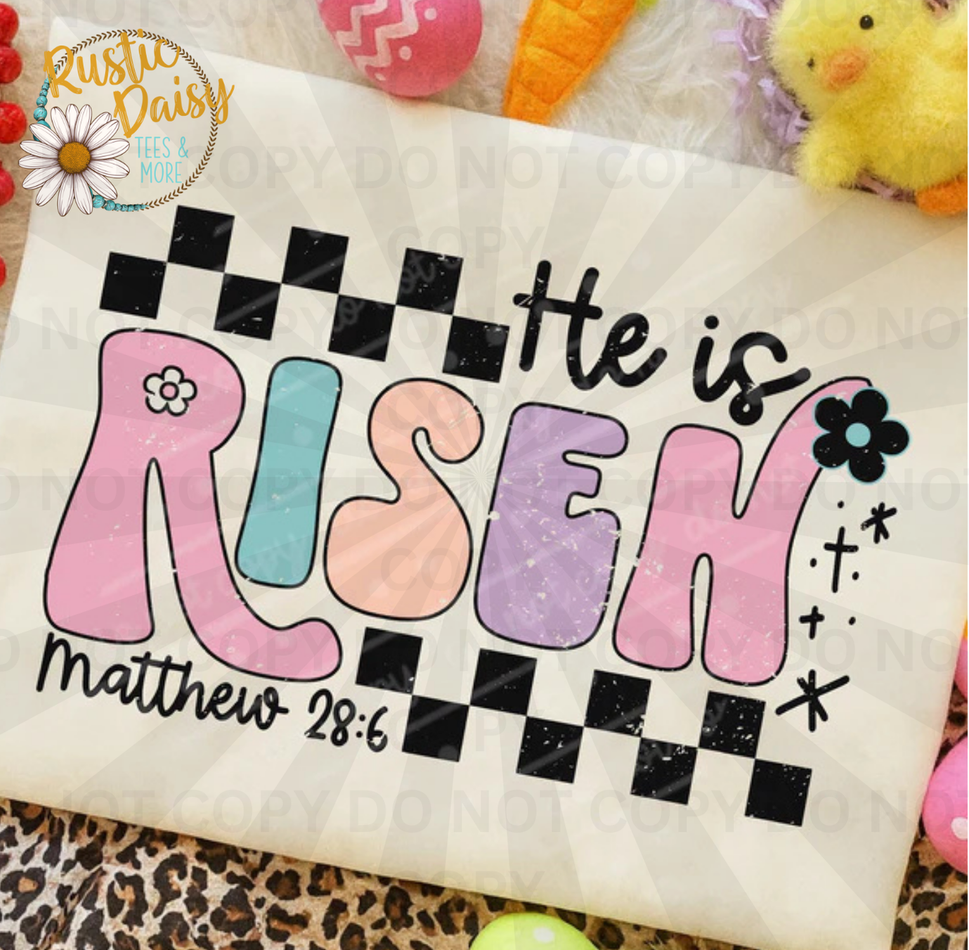 He is risen text in pastel colors with checkered pattern and flowers with Matthew 28:6 scripture reference