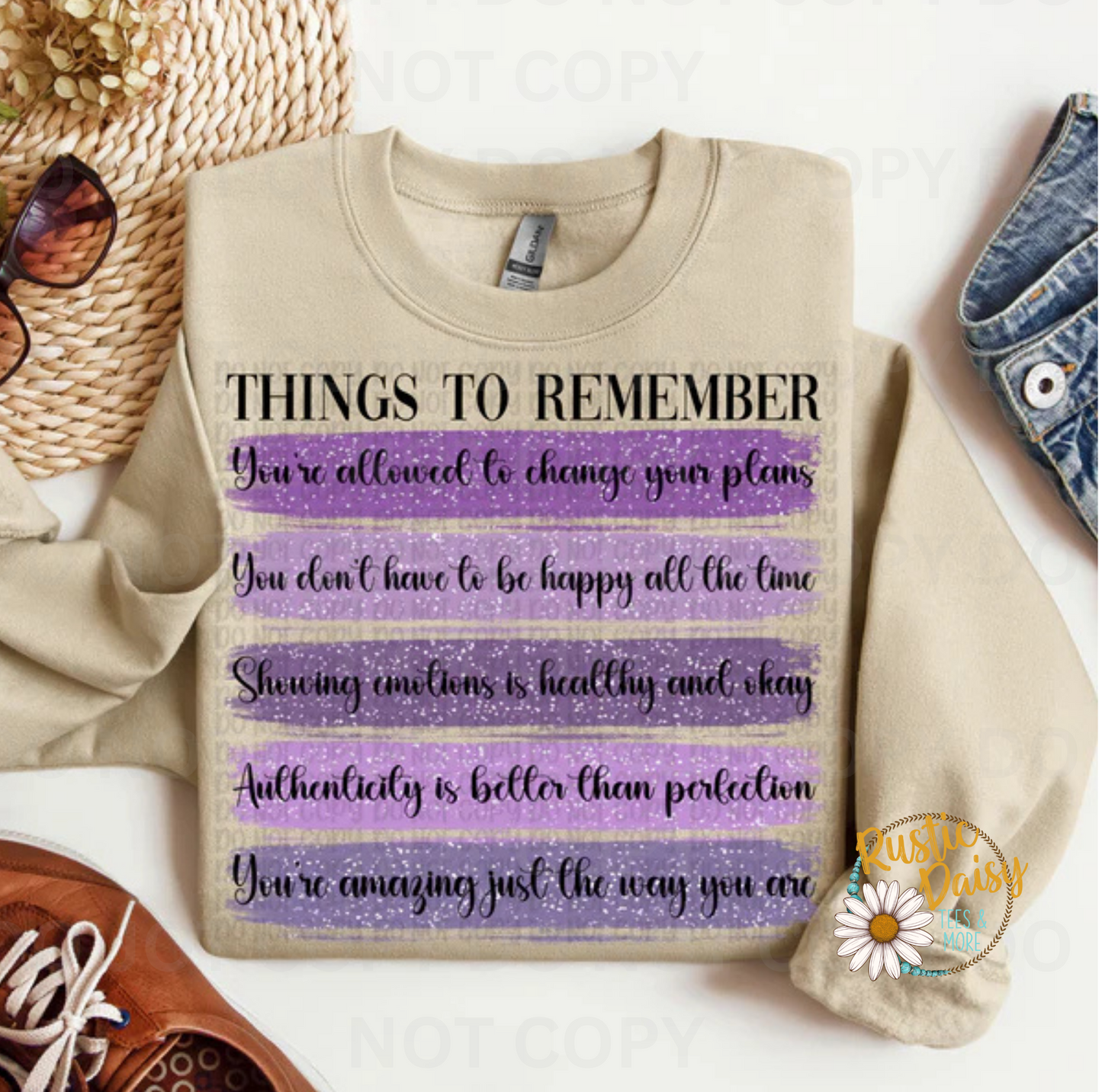 T-shirt with THINGS TO REMEMBER You're allowed to change your plans You don't have to be happy all the time Showing emotions is healthy and okay Authenticity is better than perfection You're amazing just the way you are text on purple faux glitter stripes