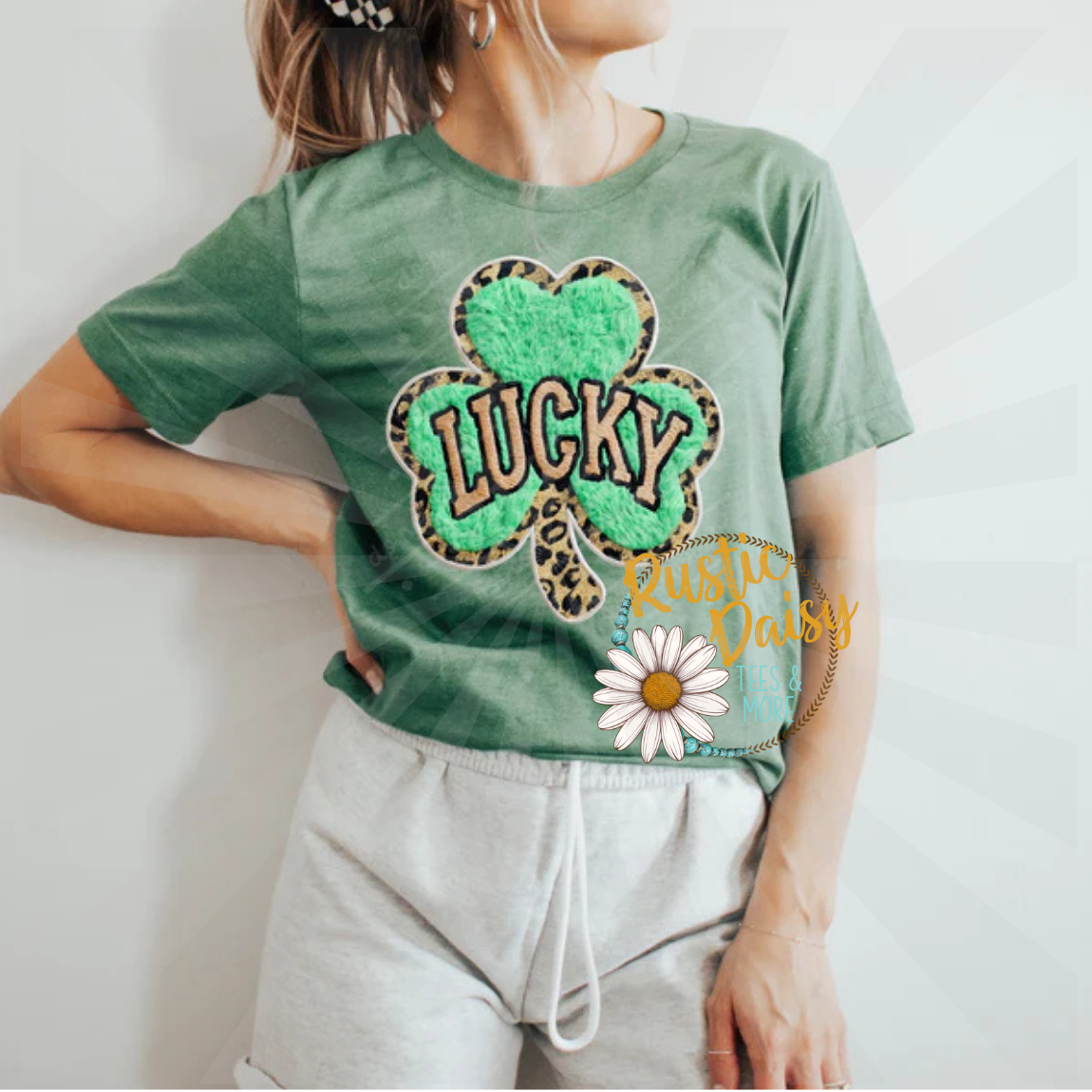 T-shirt with LUCKY text in retro letters on shamrock with leopard print border