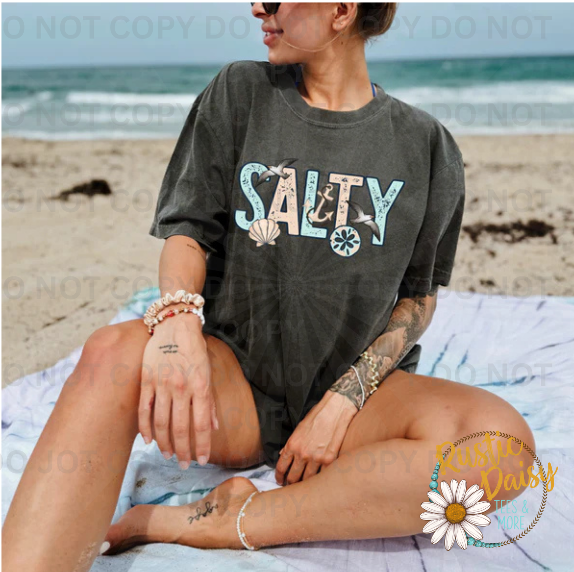 Salty text with seashells and coastal design
