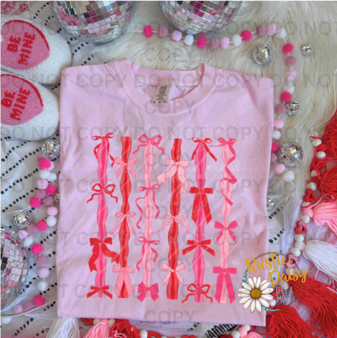 Vertical repeating pattern of pink and red ribbon bows