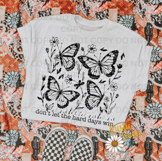 Four monarch butterflies with wildflowers and don't let the hard days win script