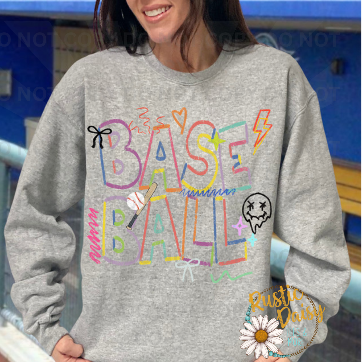 "Baseball" in multicolor doodle lettering with a bat, ball, bow, lightning bolt, and smiley face accents.