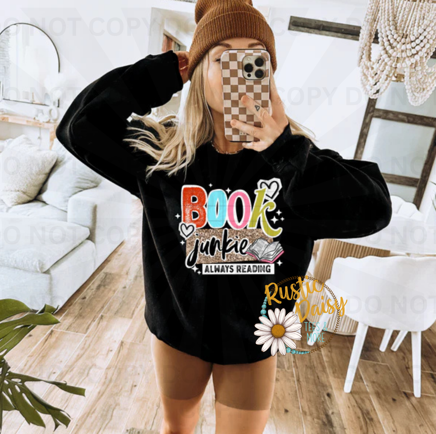 Book junkie always reading text with colorful letters, open book, hearts, and stars
