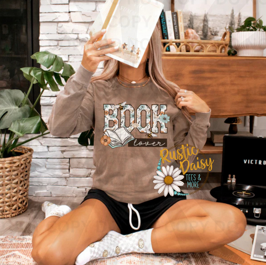 Book lover text with patterned letters and open book