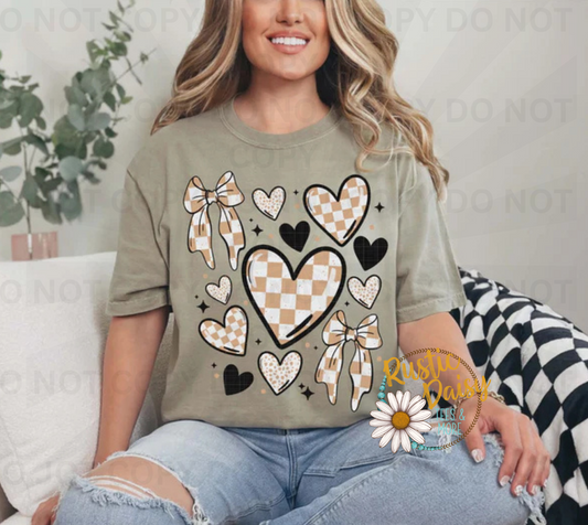 Mixed pattern of hearts and bows with checkered and leopard print accents