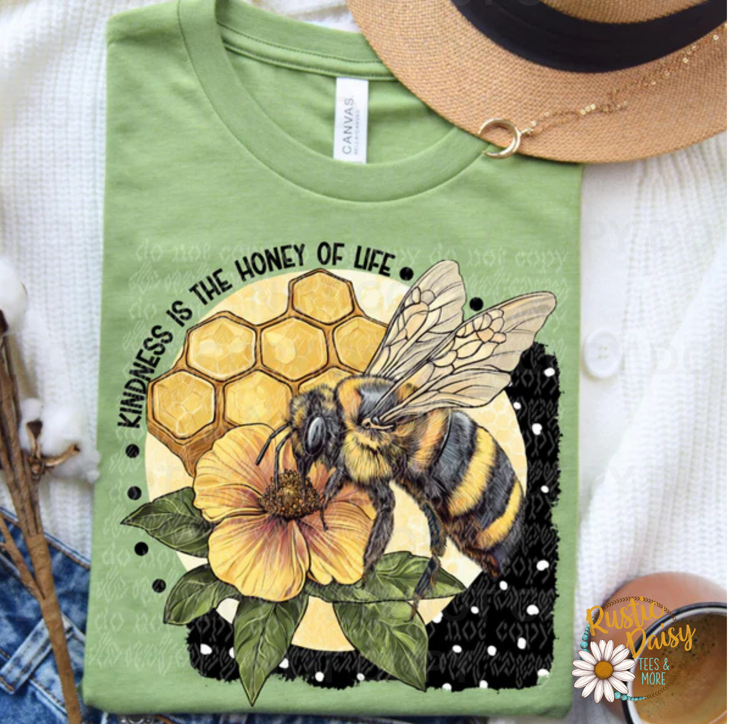 T-shirt with KINDNESS IS THE HONEY OF LIFE text with honeybee on yellow flower, honeycomb, and polka dot border