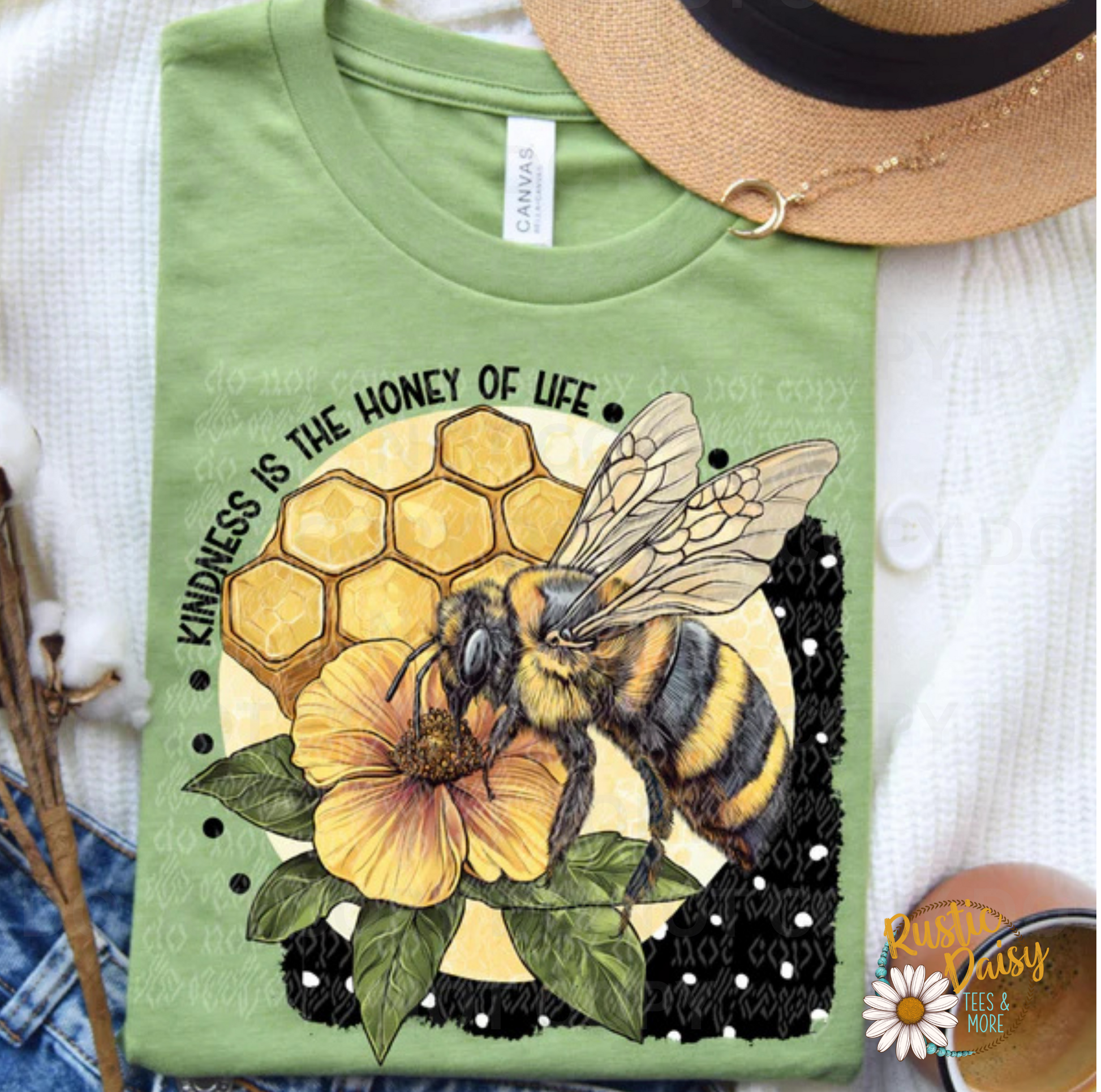 T-shirt with KINDNESS IS THE HONEY OF LIFE text with honeybee on yellow flower, honeycomb, and polka dot border