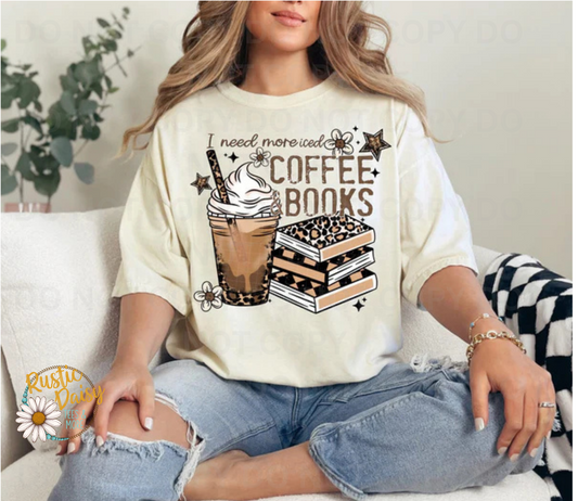 T-shirt with I need more iced COFFEE & BOOKS text, iced coffee with whipped cream, and stack of books with leopard print & checkered pattern