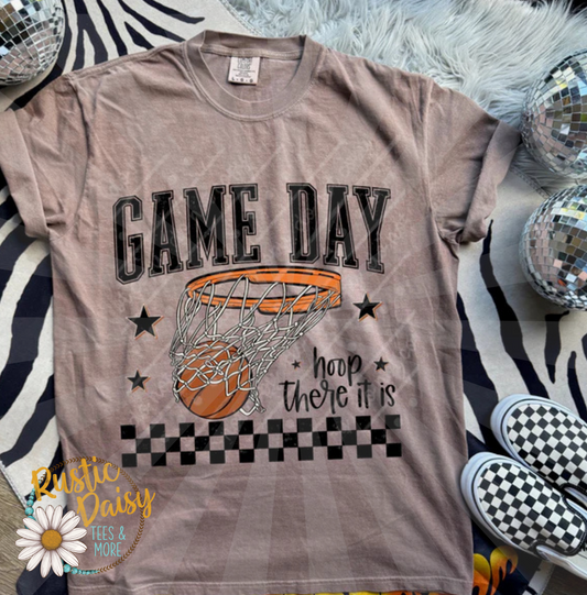 T-shirt with Game Day text, basketball, Hoop There It Is phrase, and checkered pattern accents