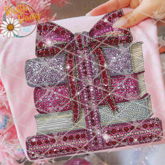 T-shirt with faux rhinestone book stack and pink leopard print bow