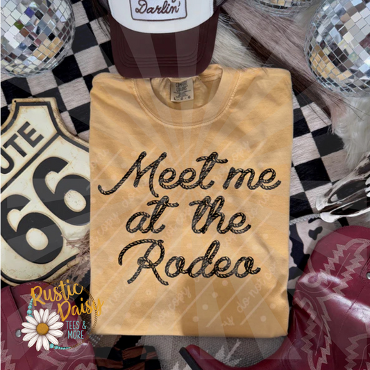 T-shirt with Meet me at the Rodeo text in rope-style lettering in black
