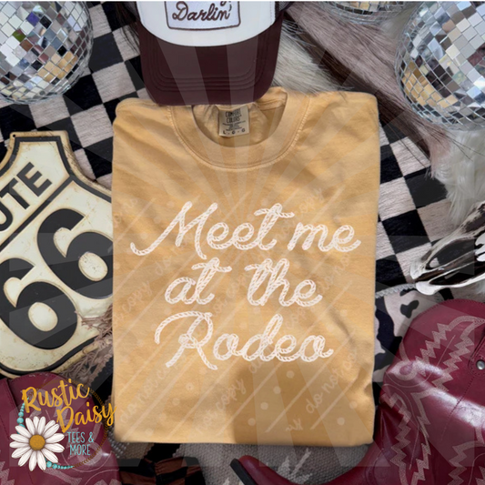 T-shirt with Meet me at the Rodeo text in rope-style lettering in white