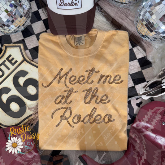 T-shirt with Meet me at the Rodeo text in rope-style lettering in tan