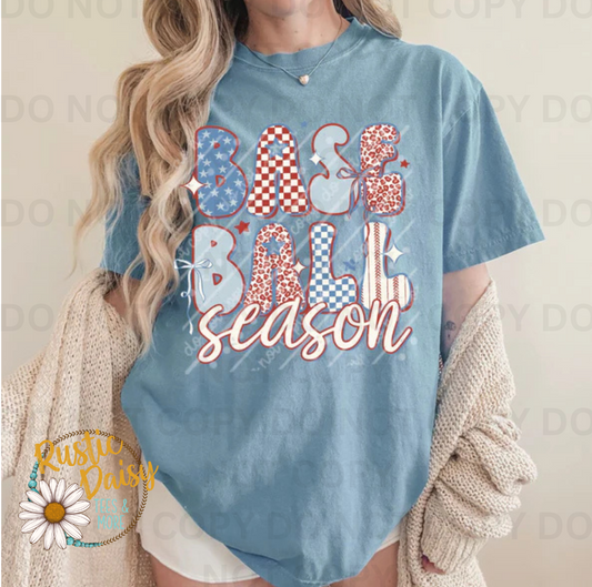 T-shirt with Baseball Season text in mixed patterned letters including stars, checkered and leopard print designs