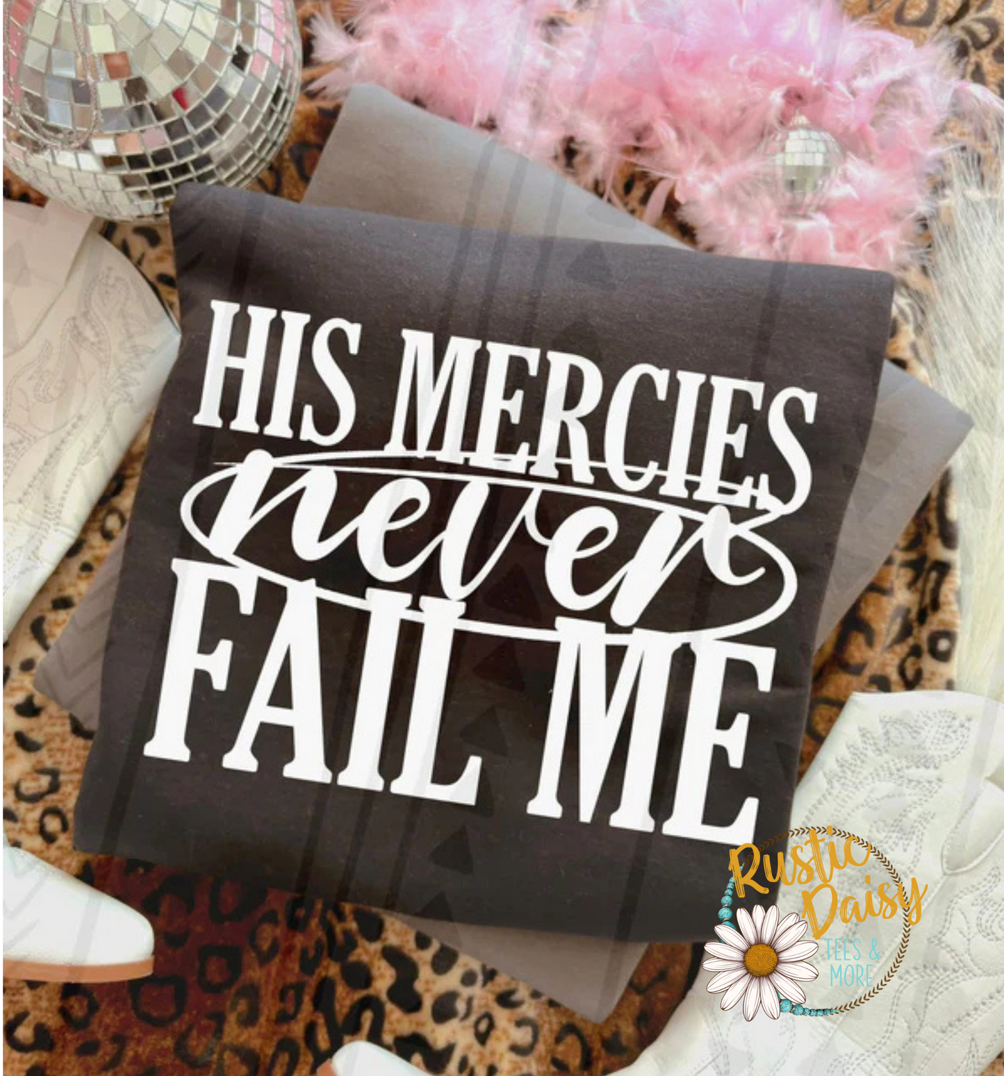 T-shirt with HIS MERCIES NEVER FAIL ME text in bold white letters