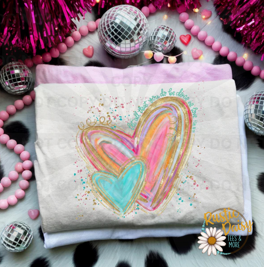 Colorful watercolor hearts with gold accents and let all that you do be done in love 1 Cor 16:14 around outer edge of heart with paint splatter accents
