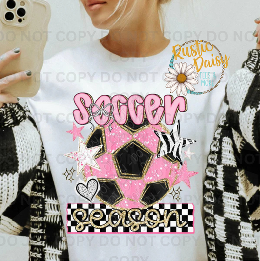 Soccer season text with pink soccer ball and bow