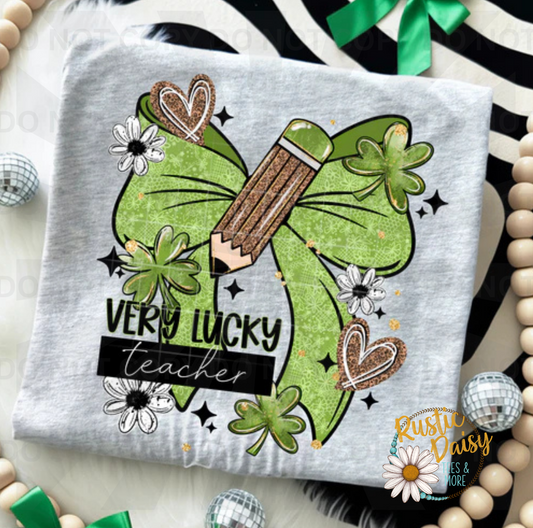 Very Lucky Teacher text with green bow, pencil, clovers, daisies, and hearts