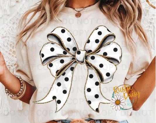 White ribbon bow with black polka dot pattern