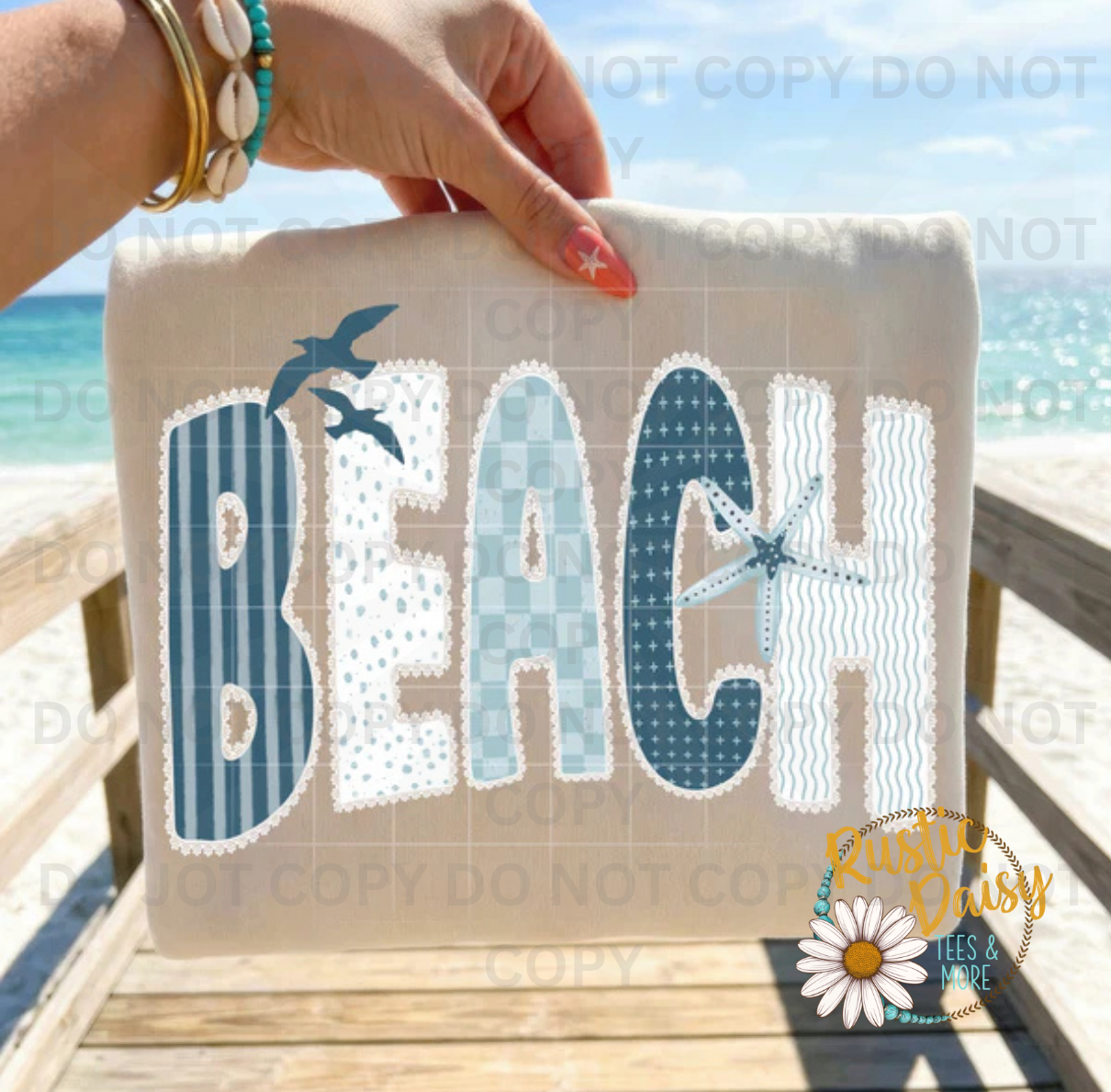 "Beach" in faux patchwork lettering with a starfish and seagulls.