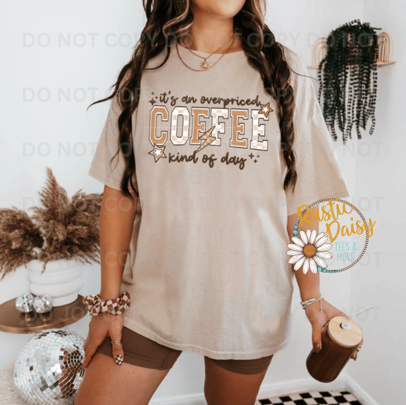 T-shirt with it's an overpriced COFFEE kind of day text in brown letters and the word COFFEE in tan outlined letters with solid tan and checkered letters