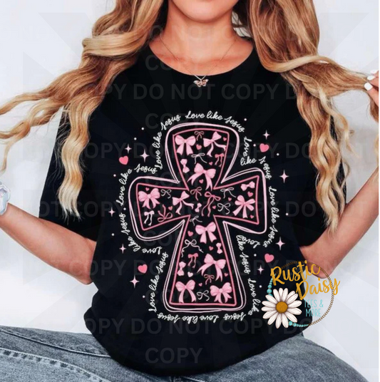 Love Like Jesus text with decorative ribbon bow and cross symbol