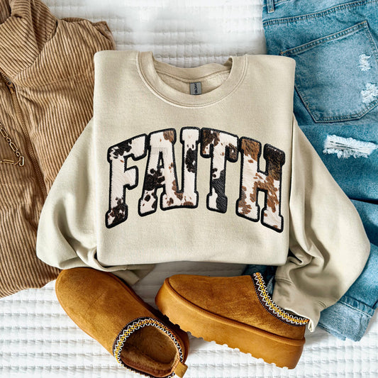 FAITH text in arched varsity style with black, brown and white faux cowhide pattern