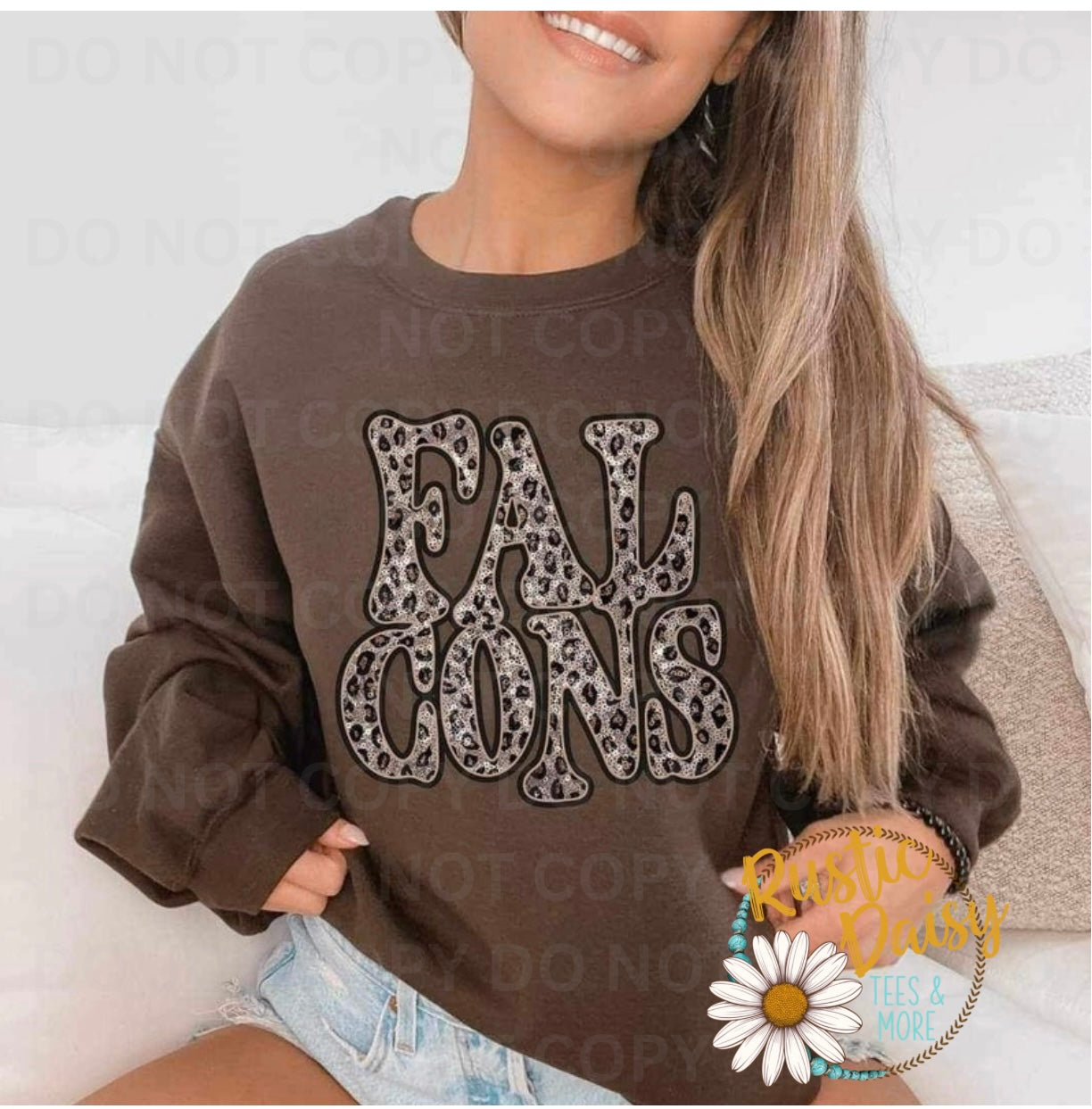 T-shirt with FALCONS text in retro wavy letters filled with leopard print pattern