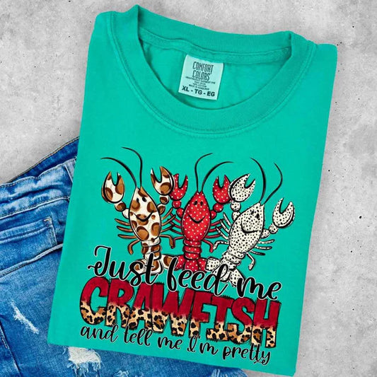 Just Feed Me Crawfish and Tell Me I'm Pretty text with patterned crawfish in giraffe, red with white dots, and white with black prints